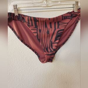 Athleta Swim Bottoms. Brown and Black print. Size M